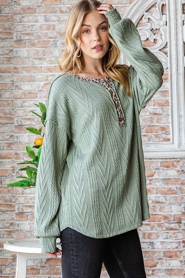 Drop shoulder cable knit top