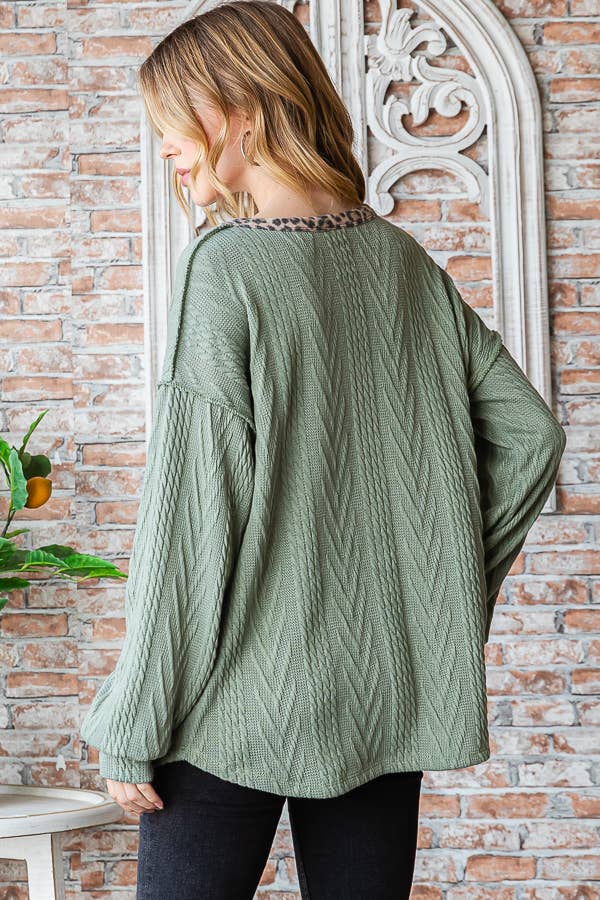 Drop shoulder cable knit top